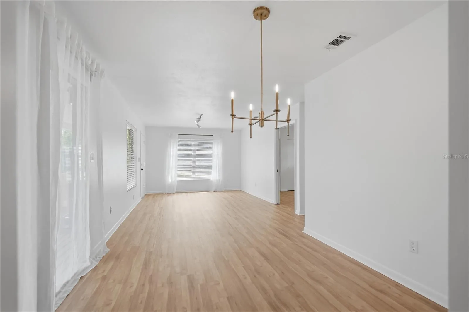DINING AREA LOOKING AT LIVING ROOM