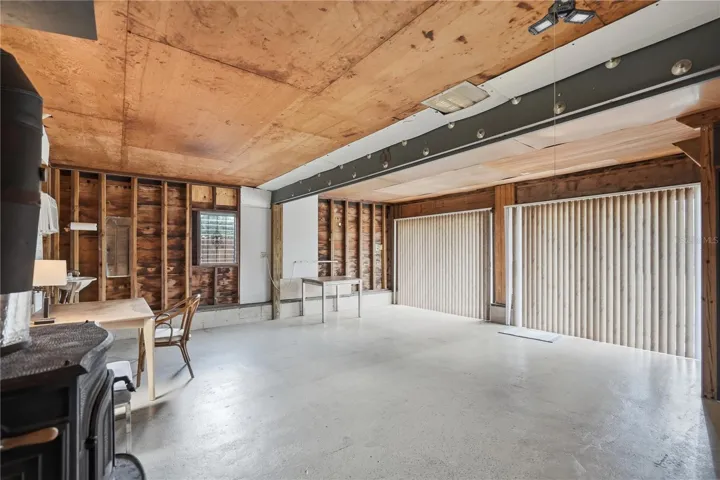 TWO SLIDERS THAT OPEN UP TO PATIO FROM DOWNSTAIRS AREA