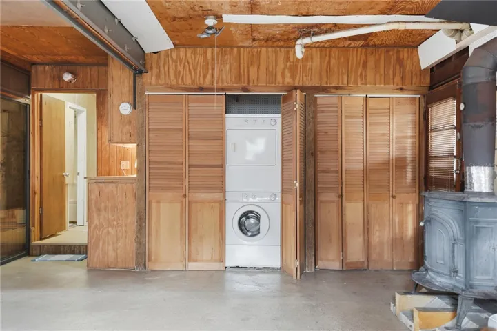 BUILT IN CLOSET WIHT LAUNDRY AND WOOD STOVE