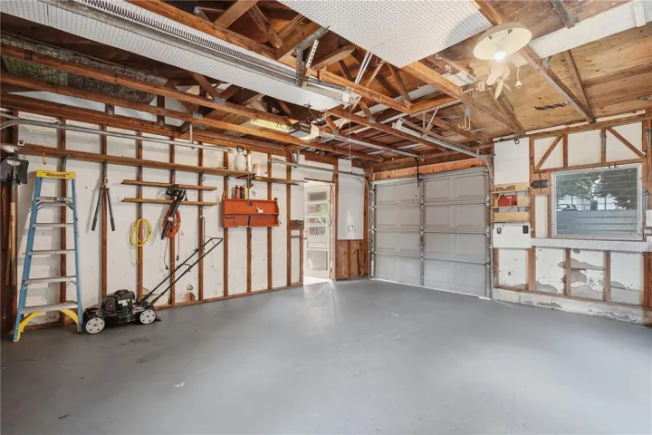 OVERSIZED ONE CAR GARAGE WITH 2 GARAGE DOORS.  ROOM FOR A LARGE WORSHOP