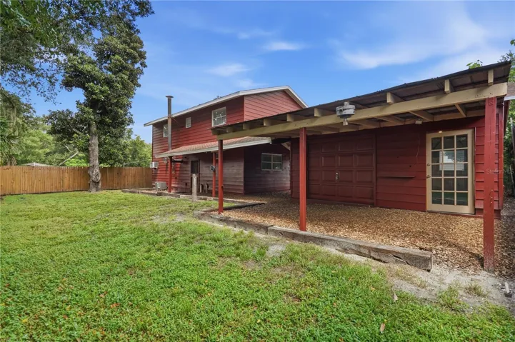 BACK OF GARAGE WITH COVERED AREA