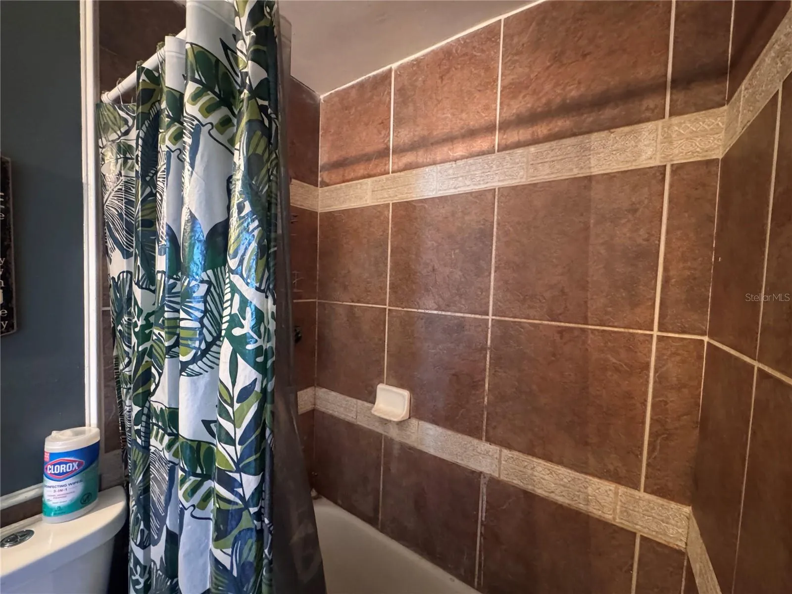 Downstairs Bathroom Bathtub with Tile