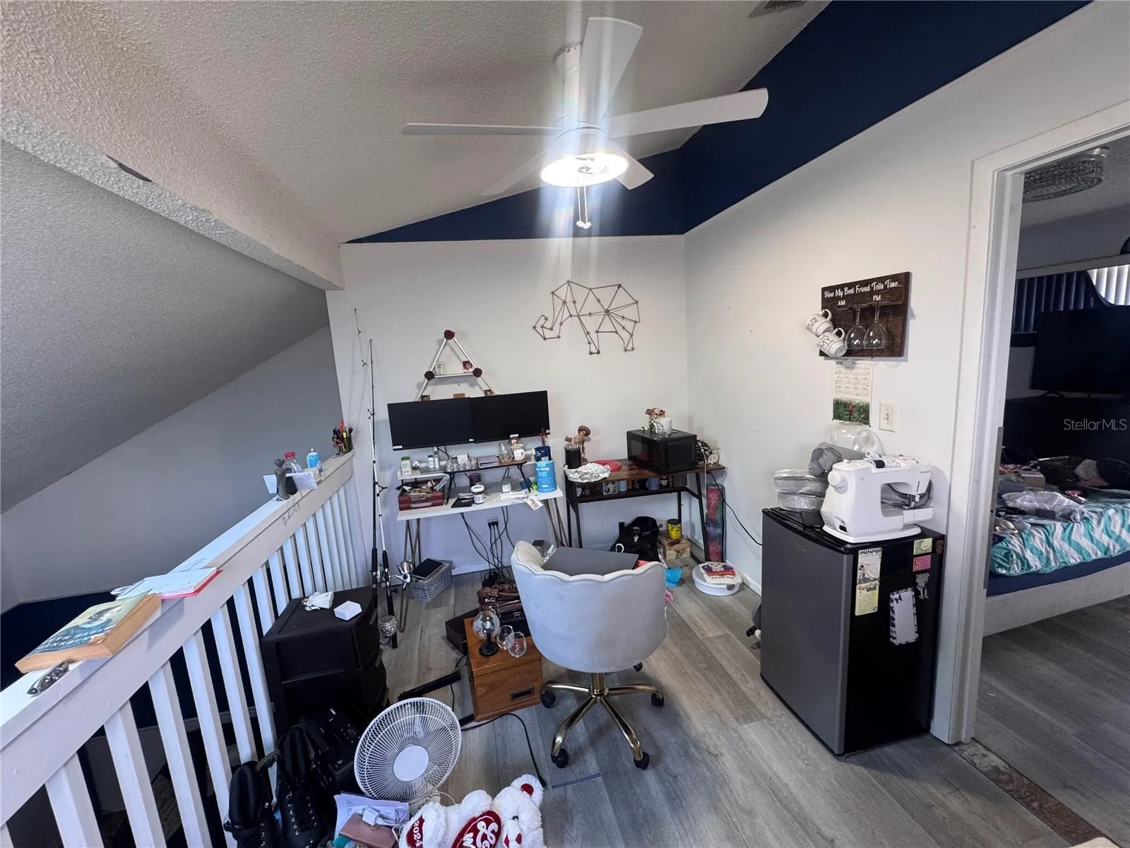 Upstairs Loft Area Overlooks the Living Space Downstairs