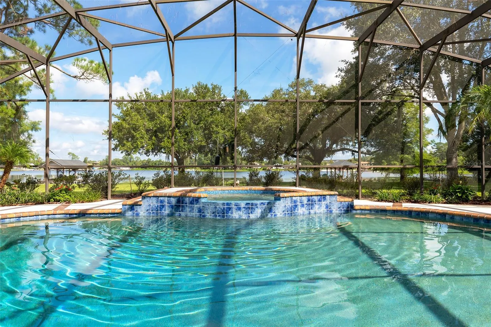 Welcome to Paradise! Heated pool and spa overlooking the lake