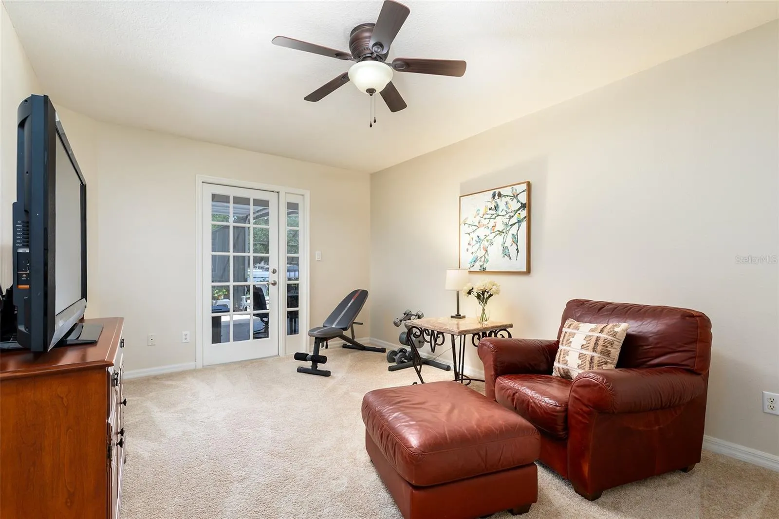 Fourth bedroom with French doors to porch