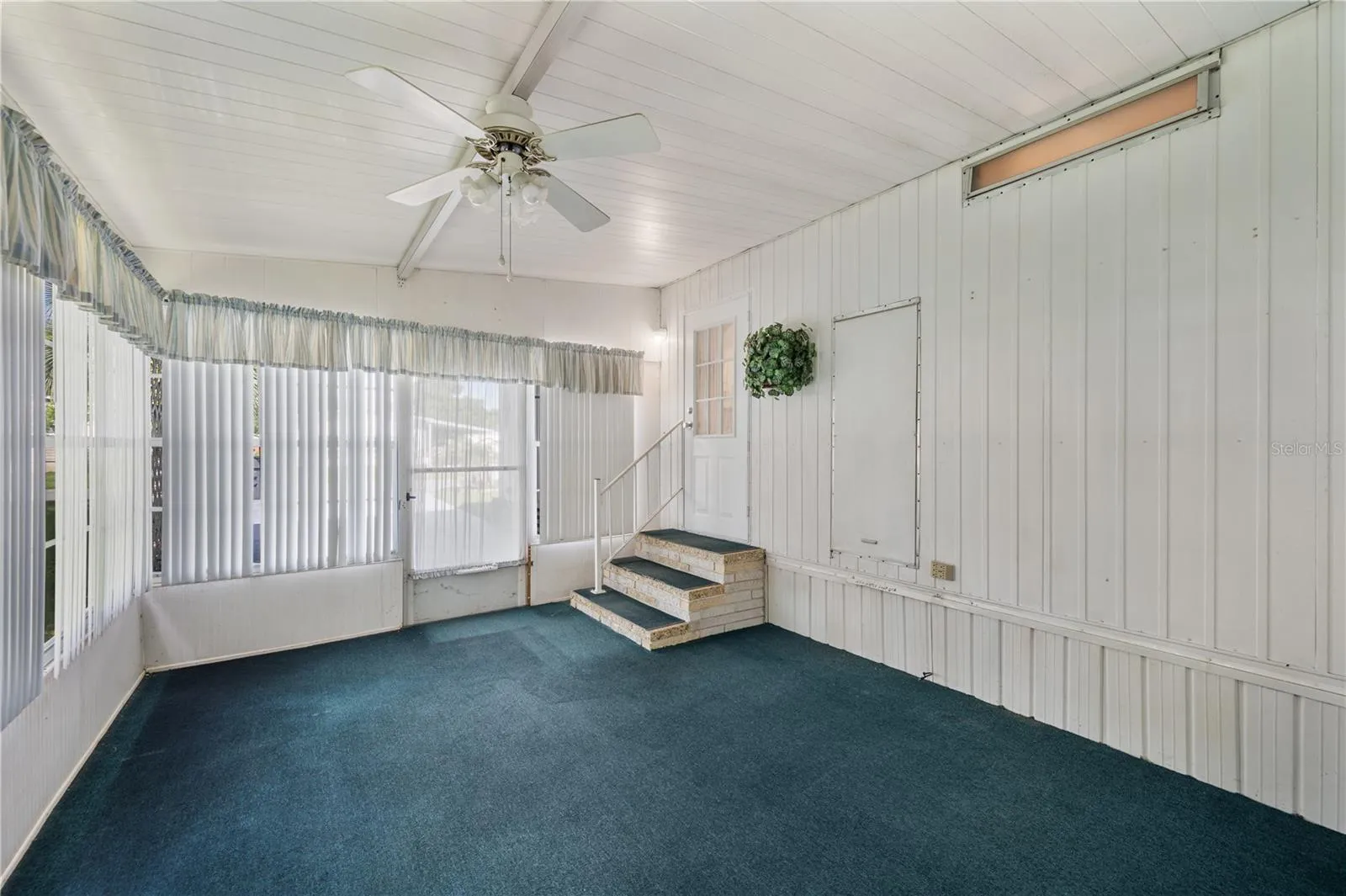 Florida room off driveway entrance