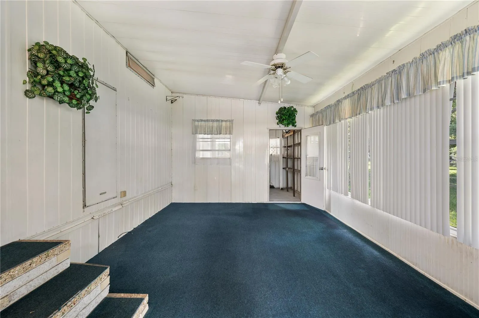 Florida room off driveway entrance