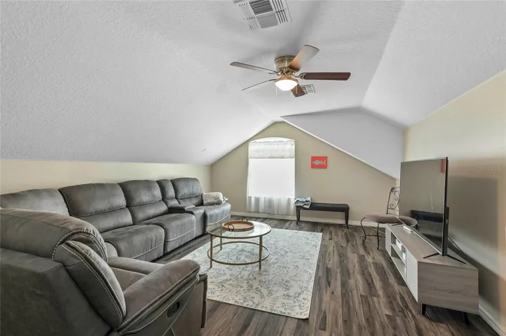 bonus/media room-above garage and access near kitchen