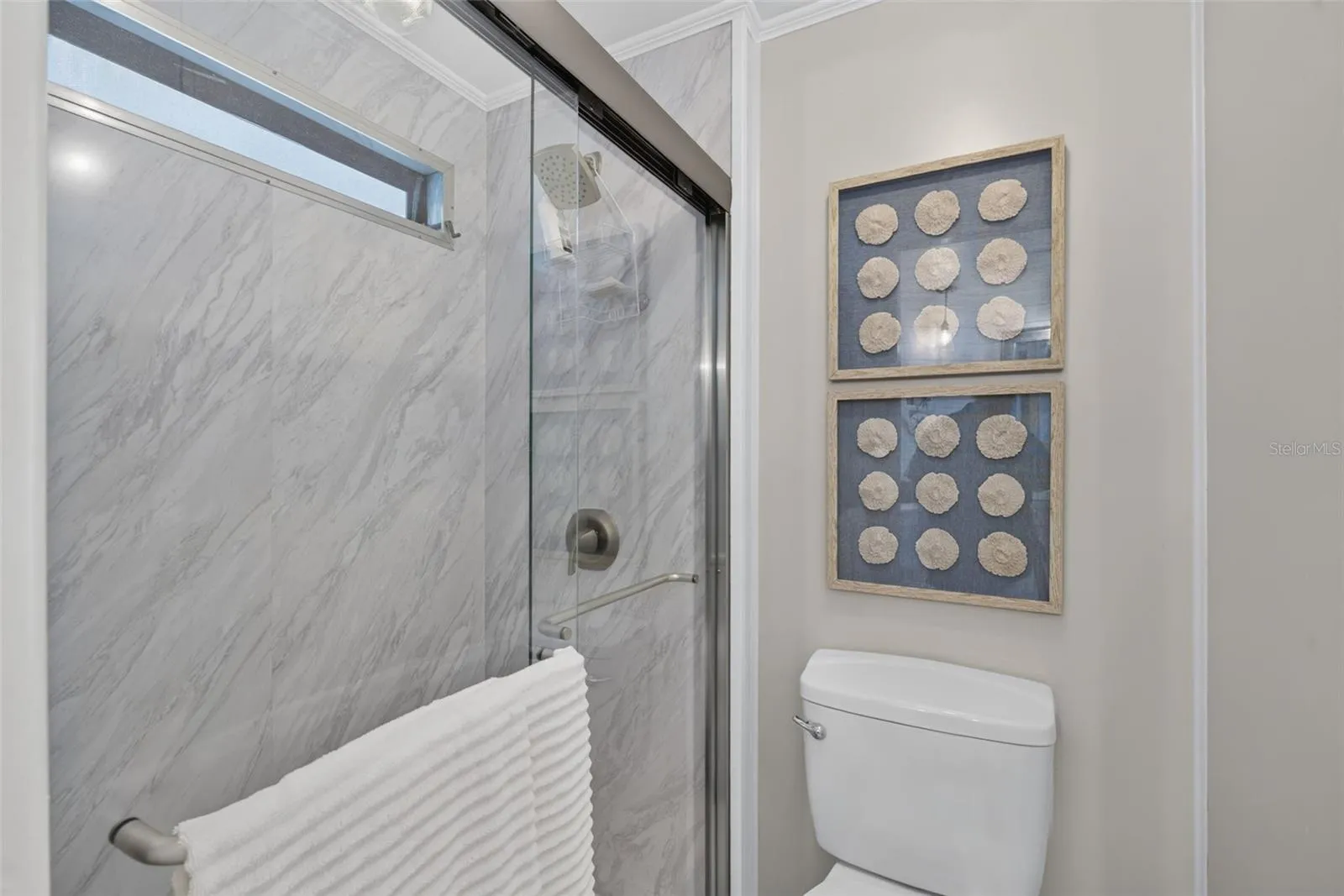 Updated primary shower with deluxe shower head