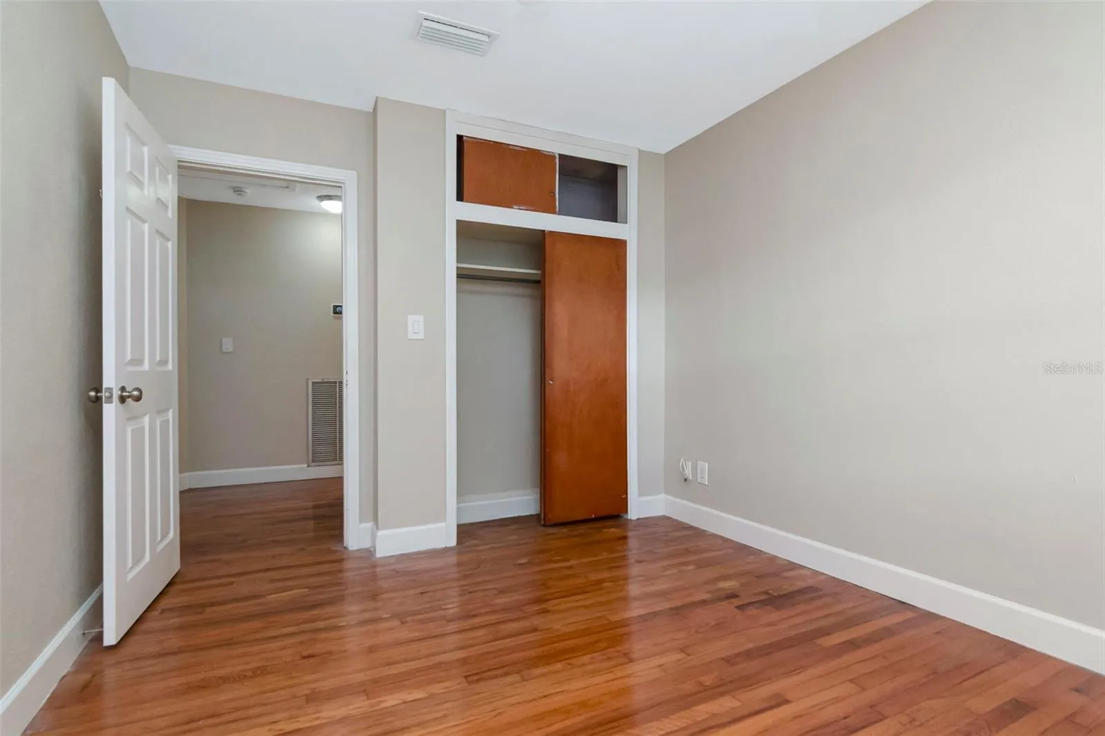 Closet with above storage