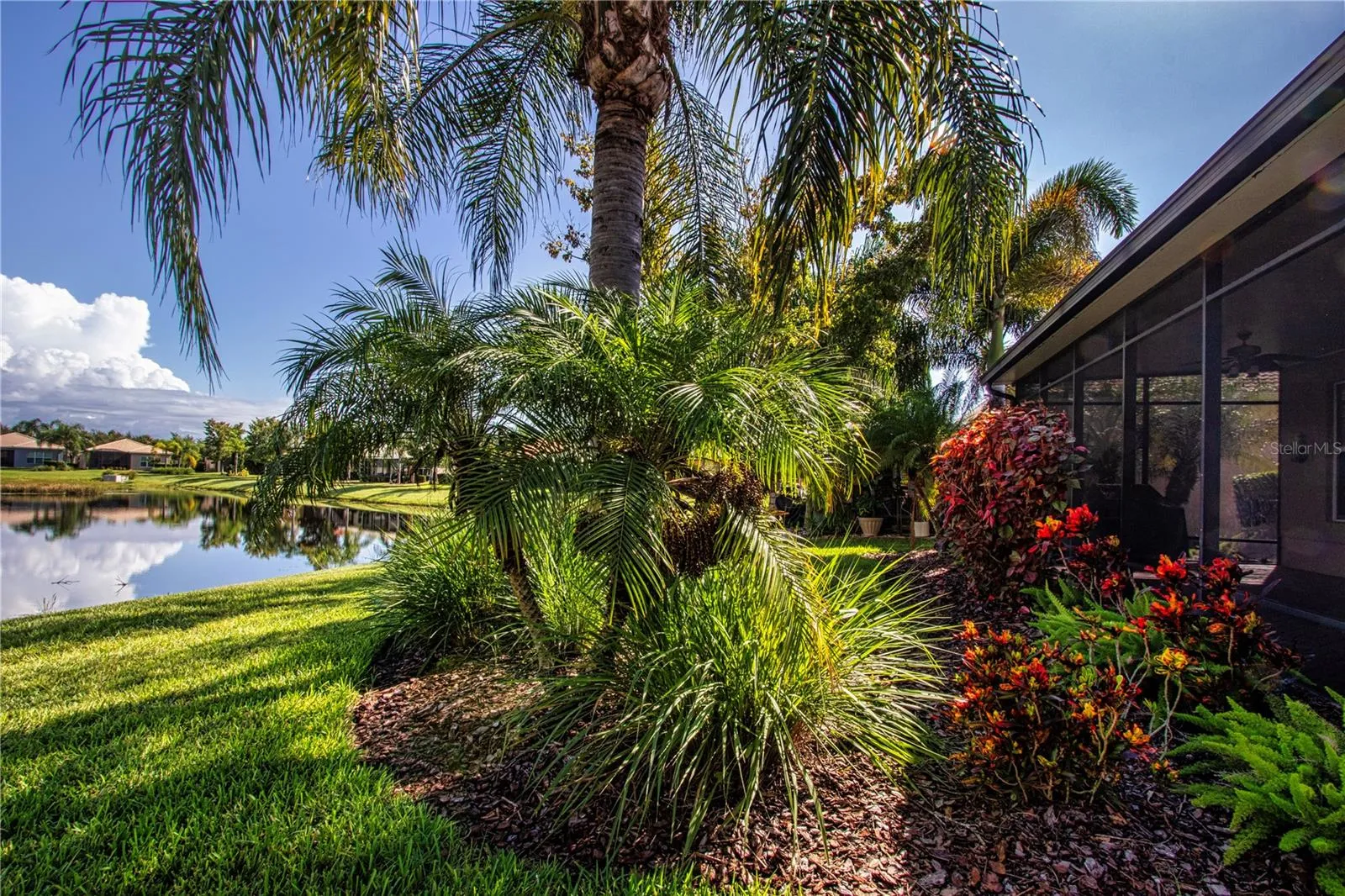 Lovely tropical landscaping maintained by the HOA