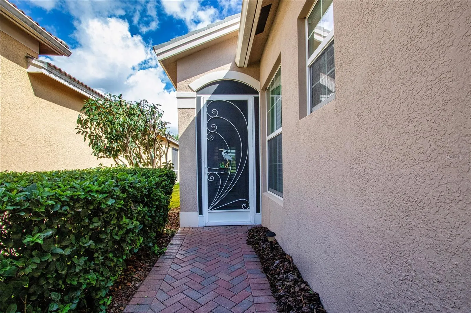 Screened entrance to home