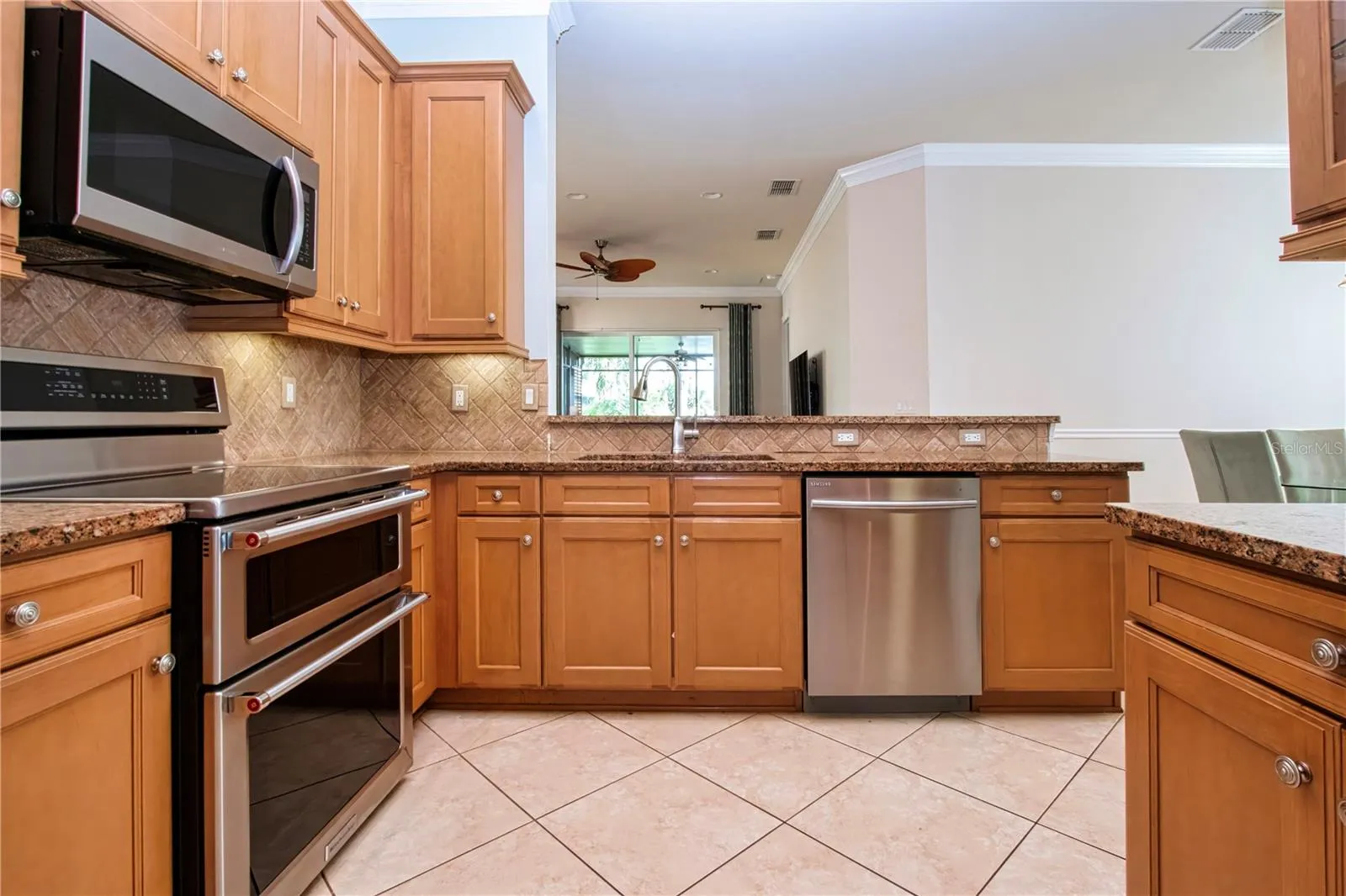 Induction range with double ovens