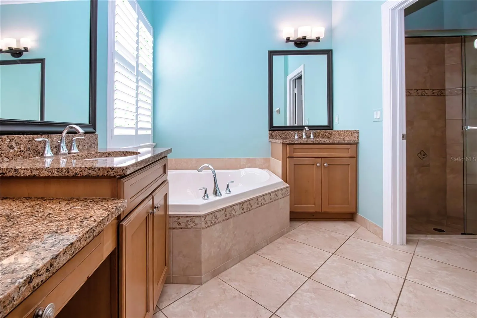 Primary En-suite Bath-Garden Tub, Walk in Shower, Dual Counters, one with a make-up vanity