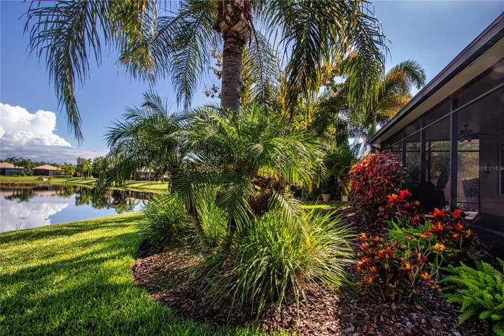 Lovely tropical landscaping maintained by the HOA