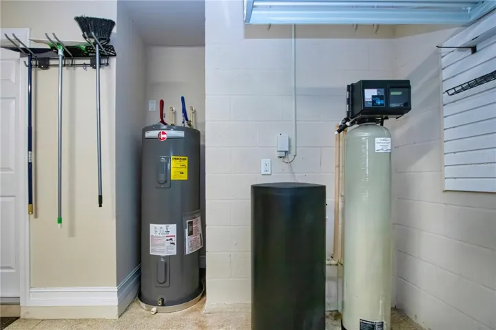 Garage with brand new water heater installed 8.26
