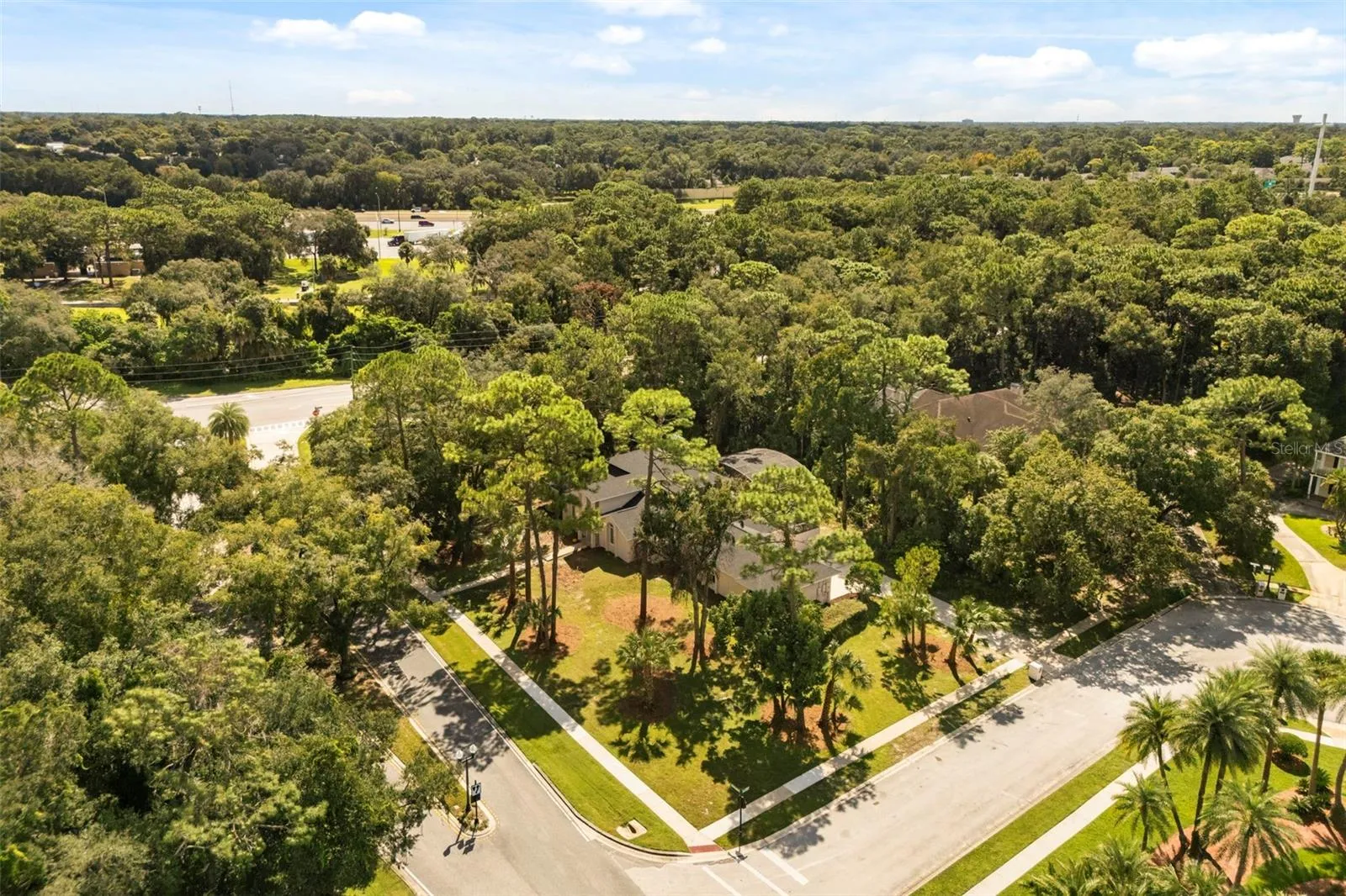 huge 1.01 acre corner lot with mature landscaping for extra privacy