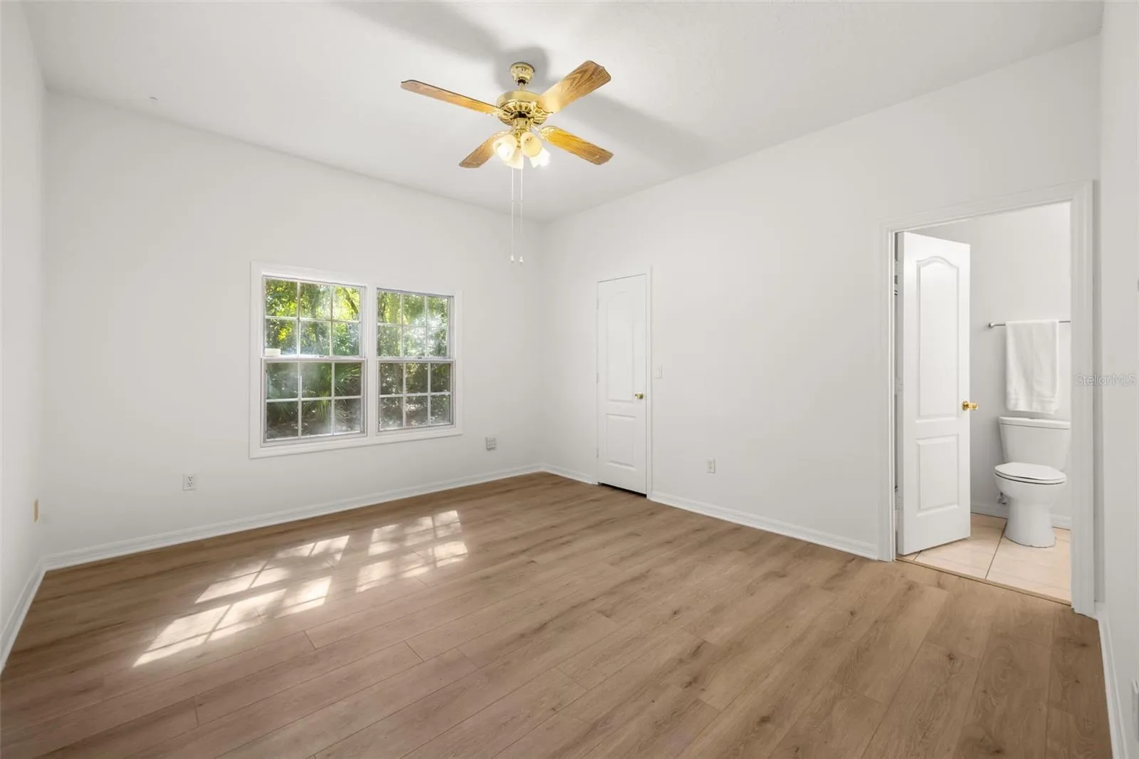 Bedroom 4 with walk-in closet and private bath that also has a door to the lanai to serve as your pool bath