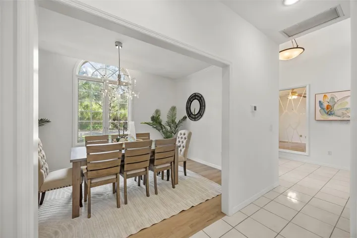 Formal dining and view of foyer