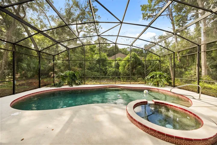 Screened lanai and recently resurfaced pool in 2013 with Pebble Tech. So tranquil and private