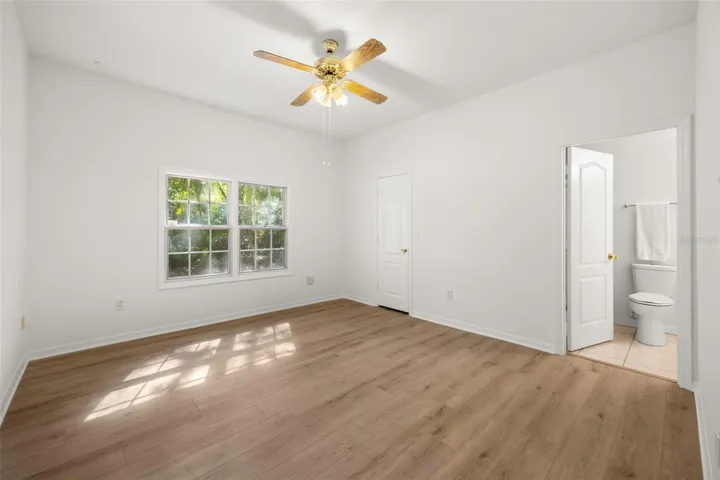 Bedroom 4 with walk-in closet and private bath that also has a door to the lanai to serve as your pool bath