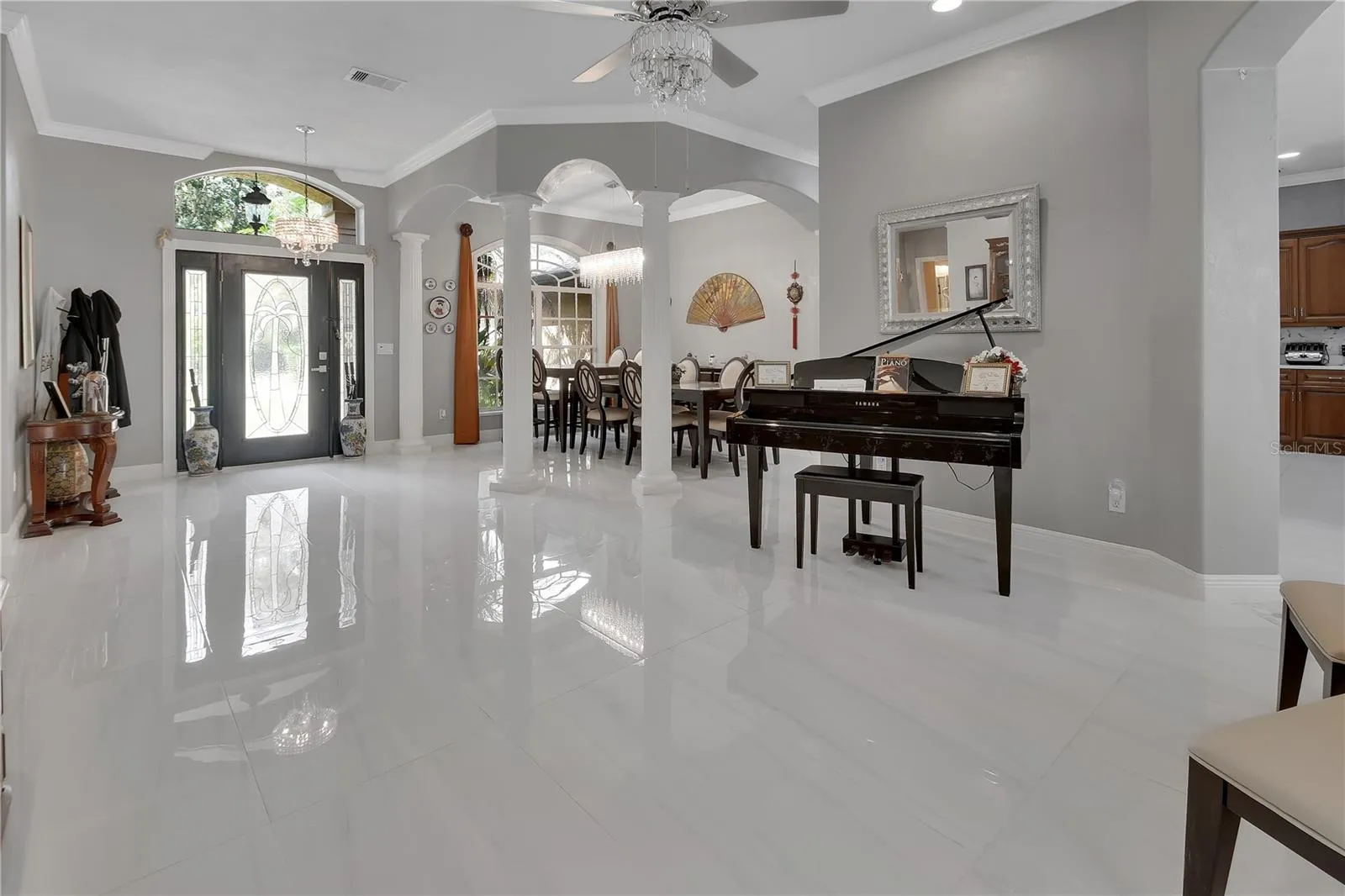 VIEW OF LIVING ROOM AND DINING ROOM