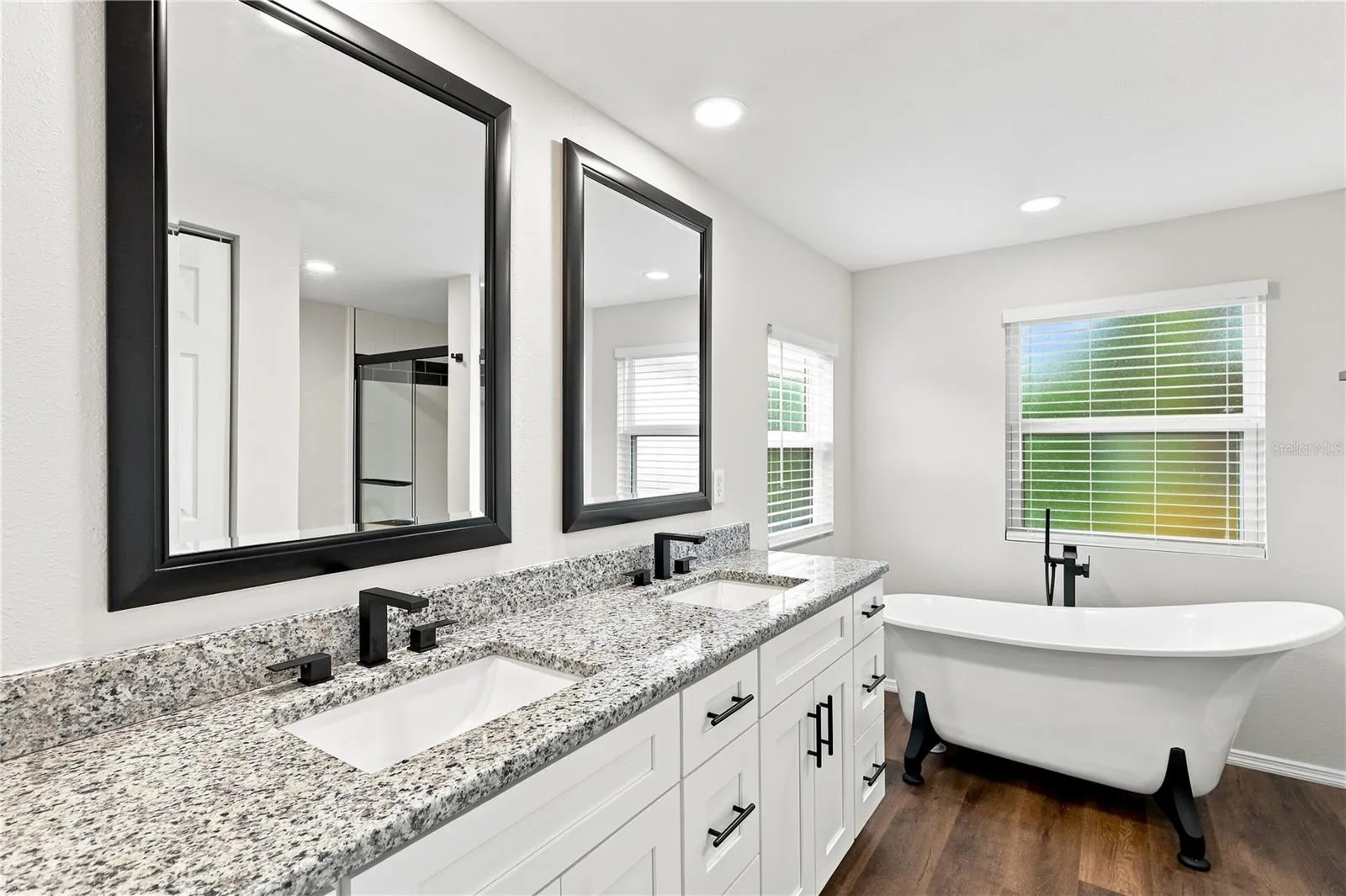 Primary on-suite bathroom with claw tub.