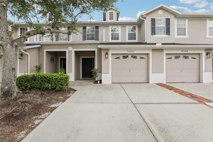 Welcome Home to the DESIRABLE Avalon Lakes Village community in East Orlando and this beautiful 3-BEDROOM, 2.5-BATH TOWNHOME with a PEACEFUL CONSERVATION VIEW, fantastic amenities and a prime location!