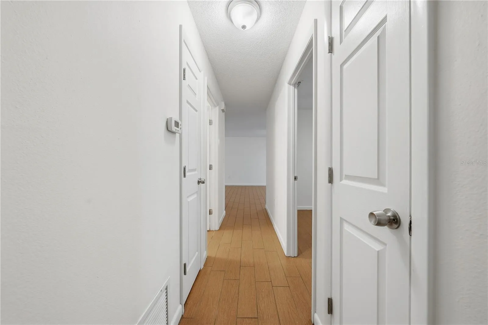 HALLWAY TO BEDS/BATHS