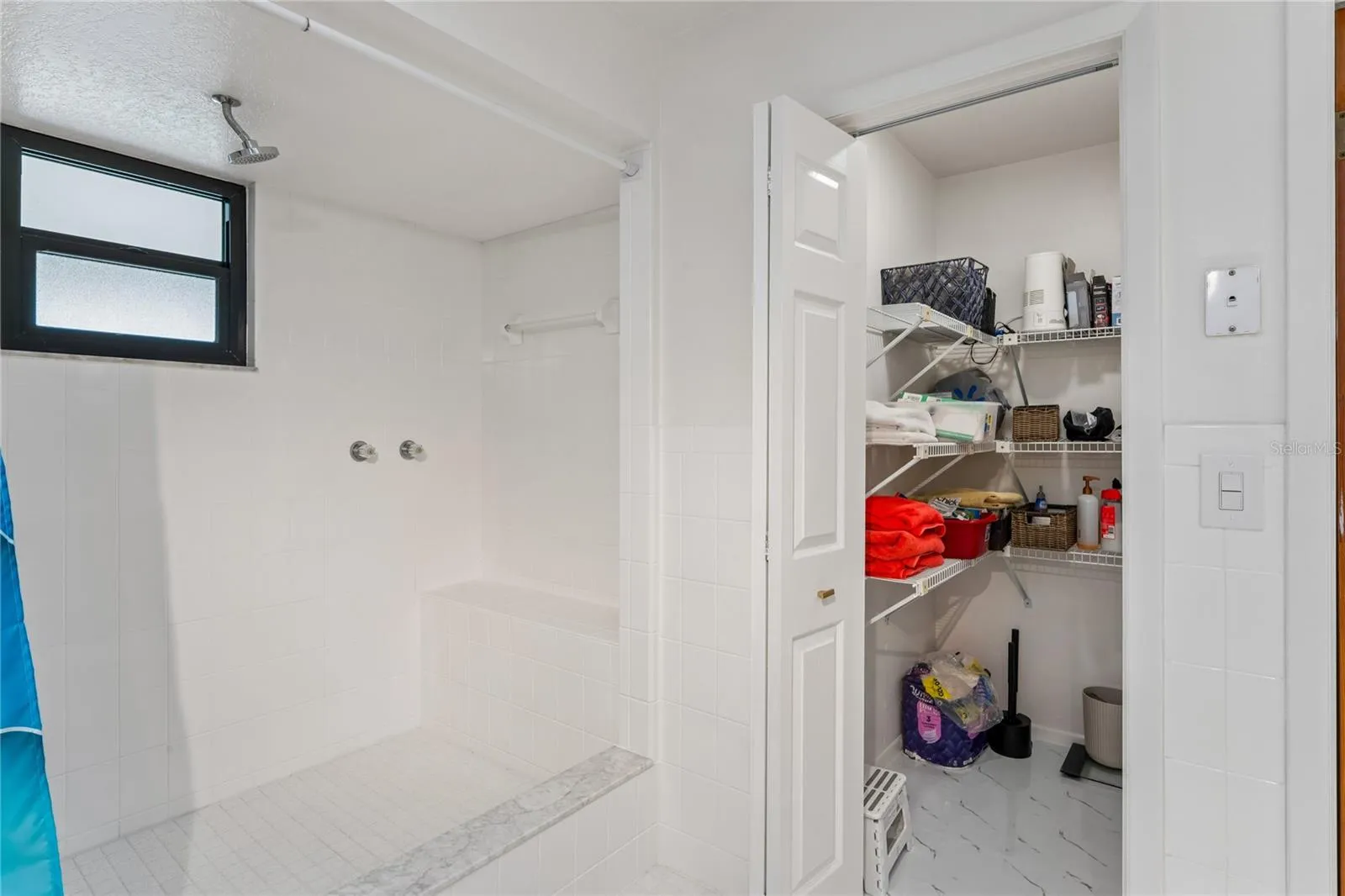 LARGE CLOSET IN BATHROOM