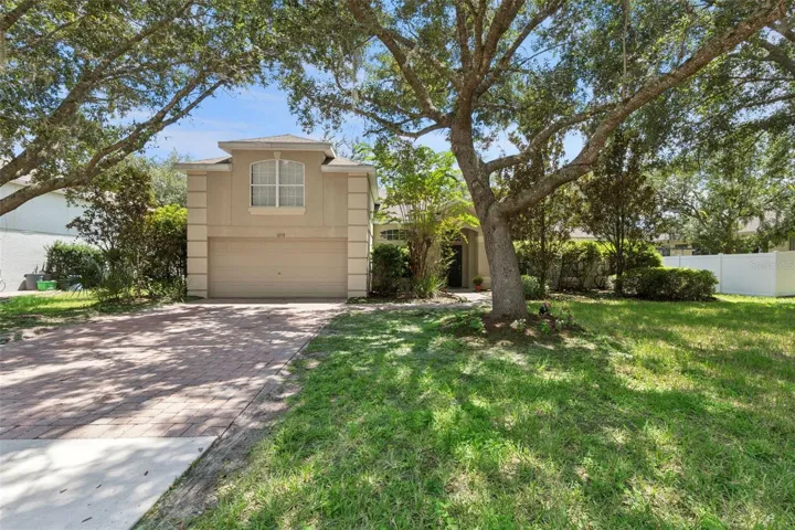 Beautiful curb appeal and mature landscaping welcoming you home