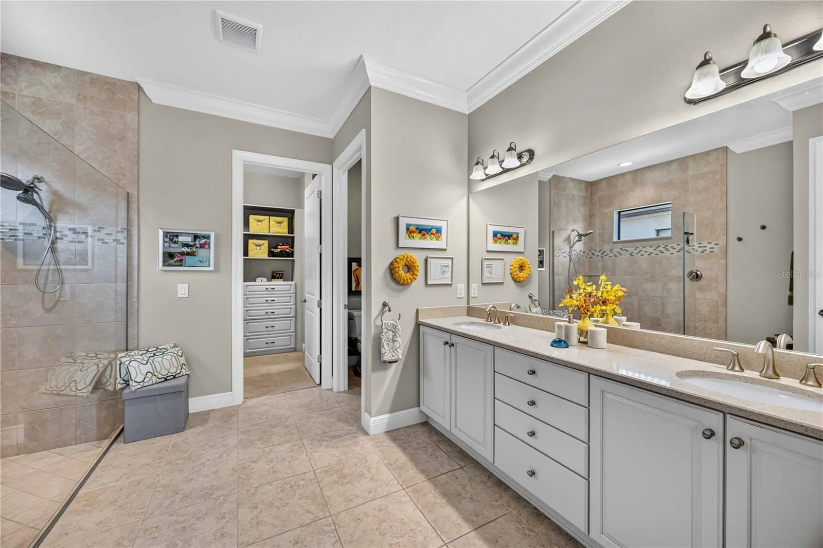 dual sinks in the counters and independent shower with private water closet.