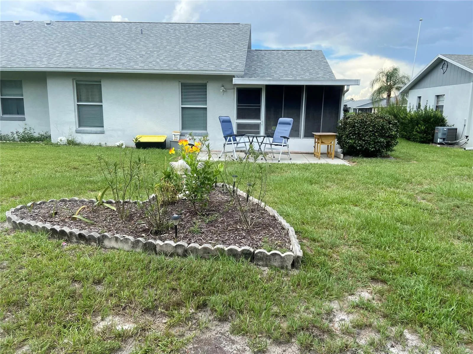 back yard, heart shaped flower bed