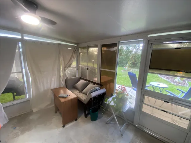 back screened porch w/ceiling fan