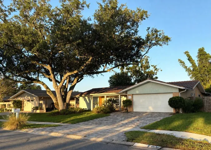Alt. Exterior view. Newer paver driveway.
