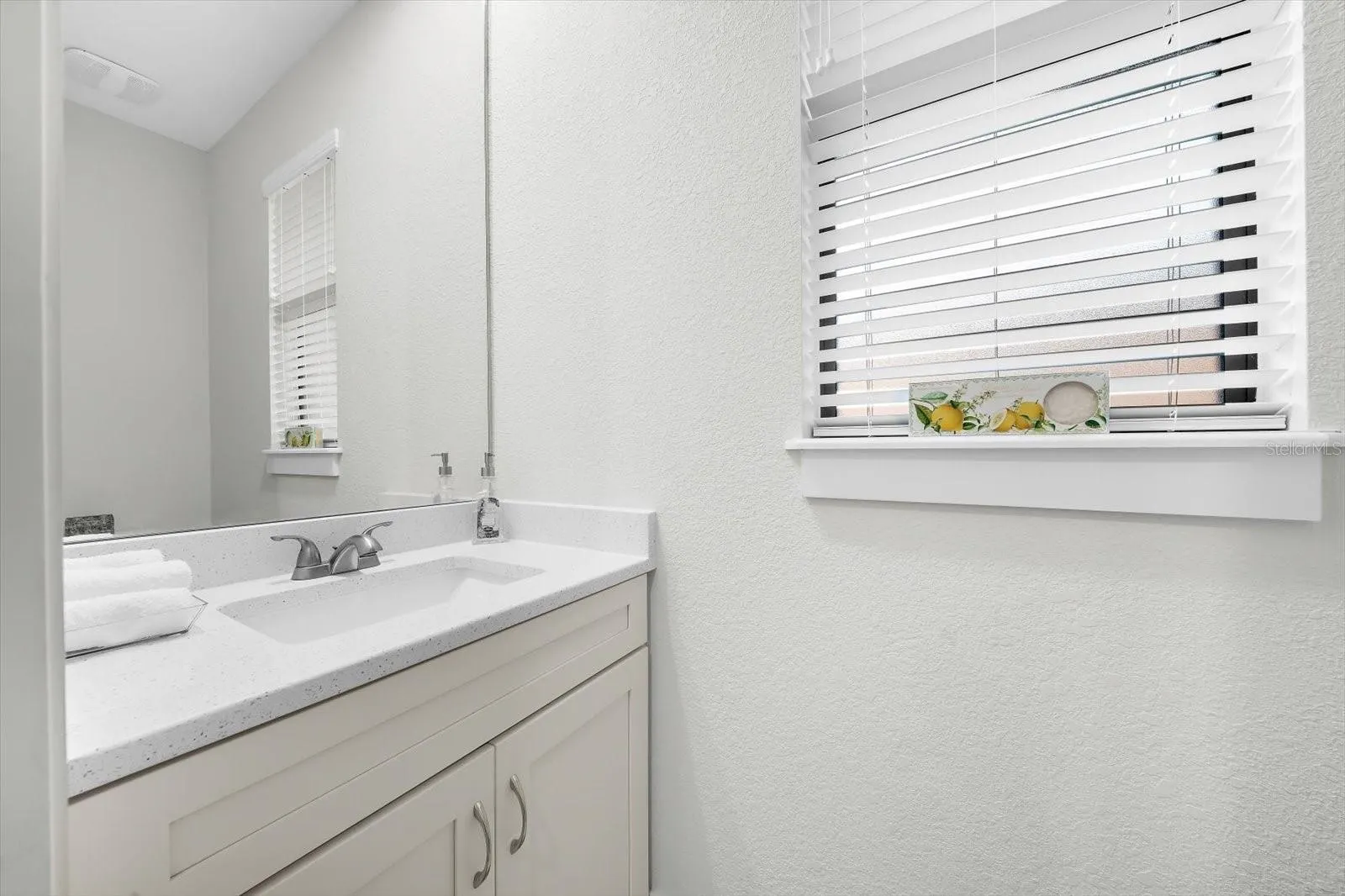Half-Bath Conveniently Located Near Laundry
