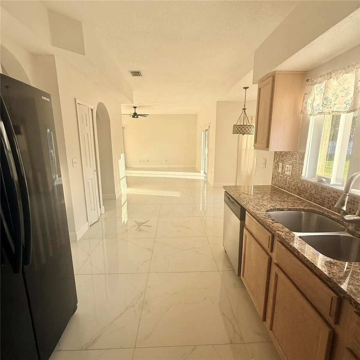 Kitchen has a spacious pantry