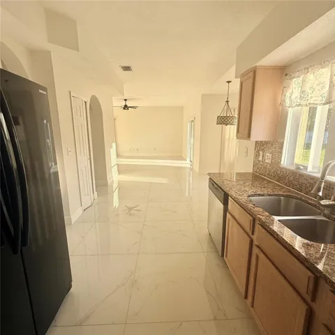 Kitchen has a spacious pantry