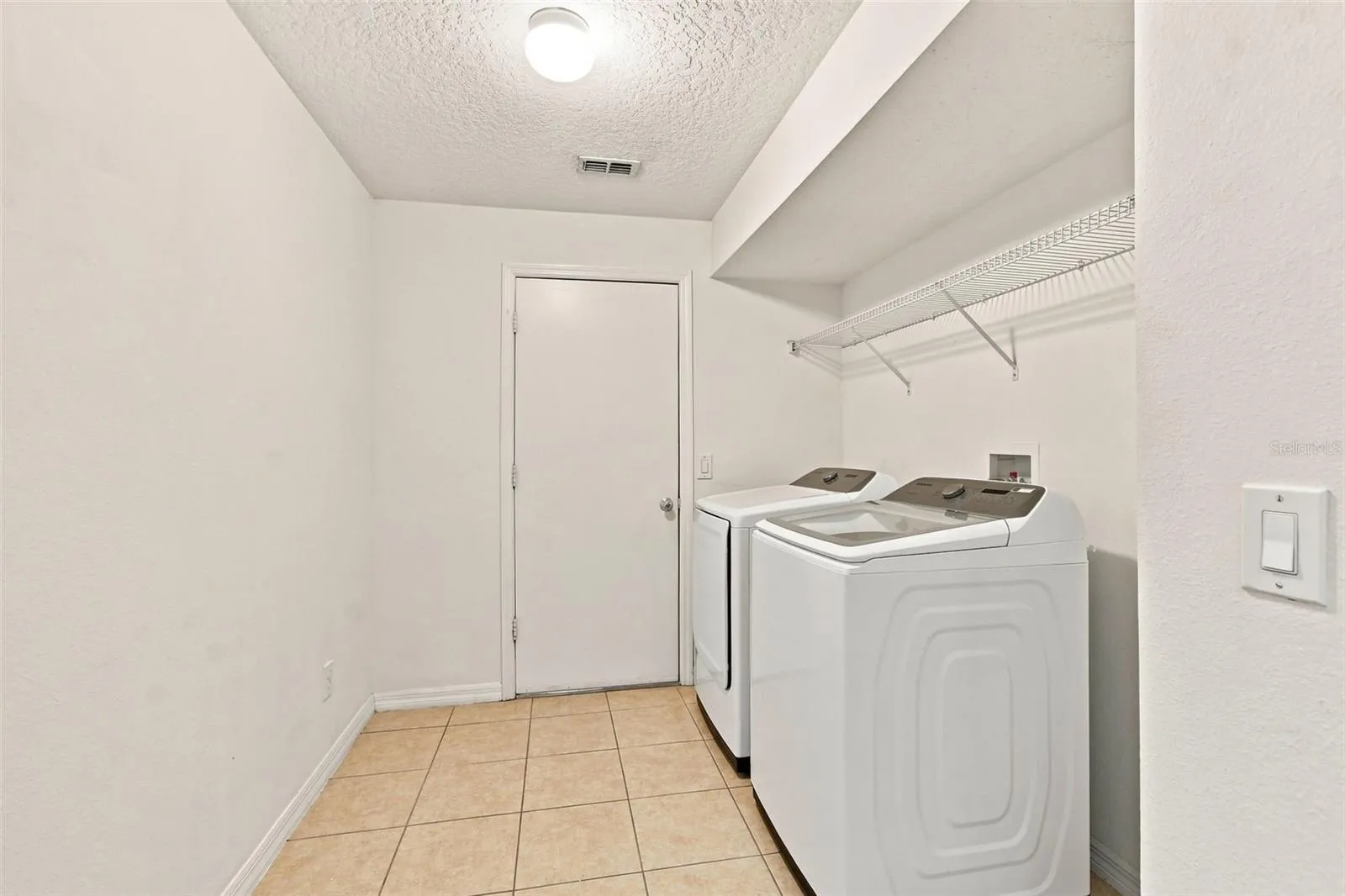 Interior Laundry Room with Washer and Dryer