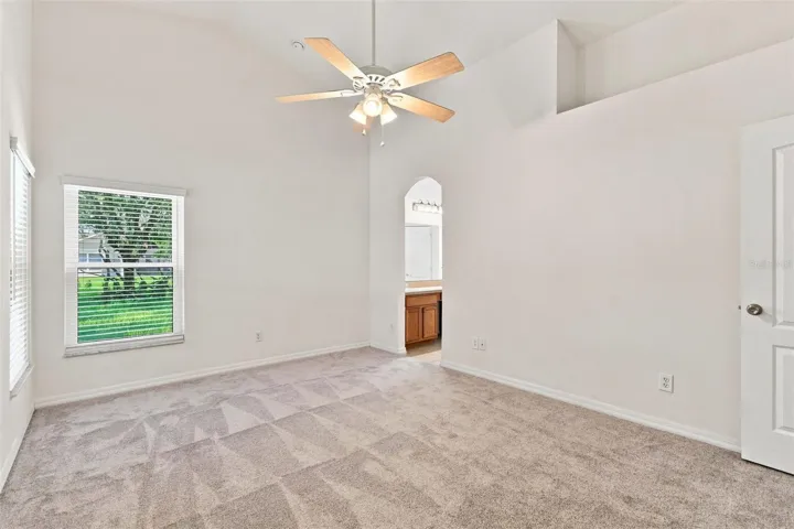 Primary Owner's Suite with Volume Ceilings, Fan and New Carpets