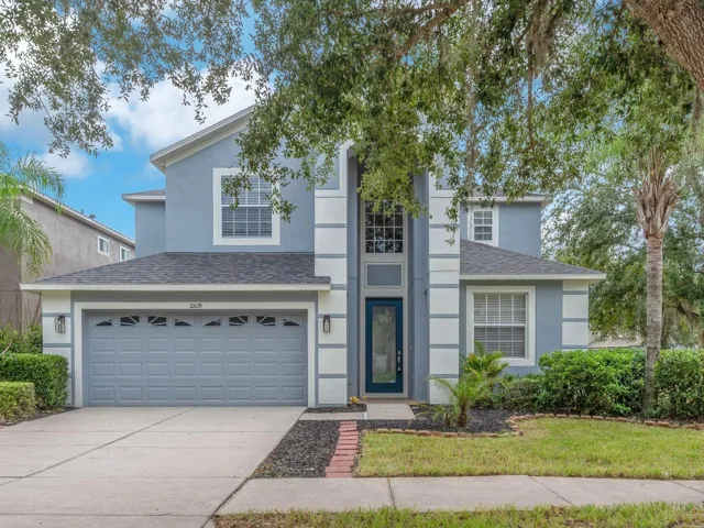 5-bedroom, 3-bath home with a 3-car tandem garage, ideally situated on a premium corner lot in the gated golf course community of Heritage Isles.