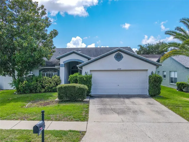 Set along an established Countryway street, this single-story 4-bedroom, 2-bath home features mature landscaping, a covered arched entry, and an attached two-car garage.