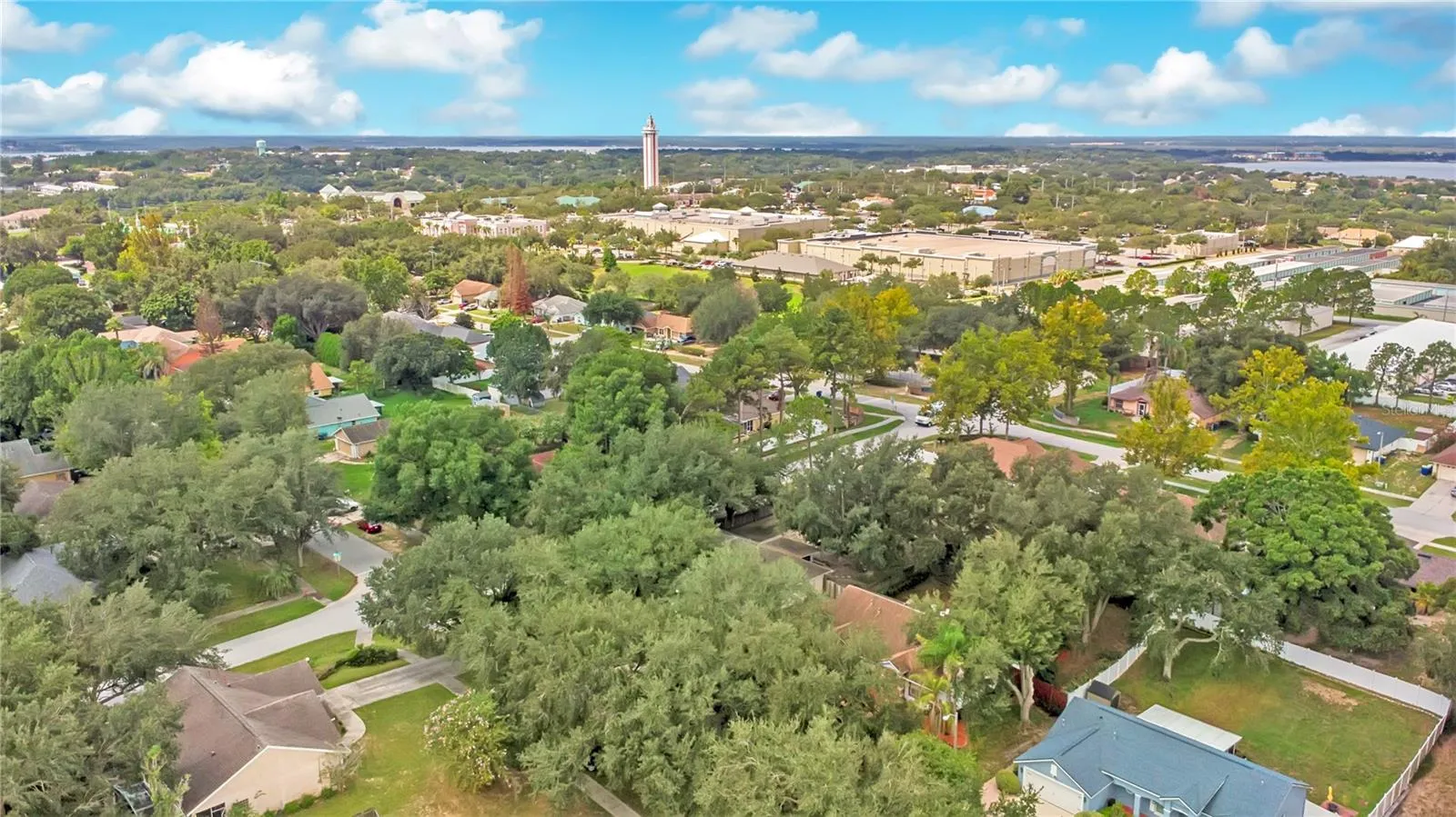 Aerial view of home in neighborhood and the Citrus Tower