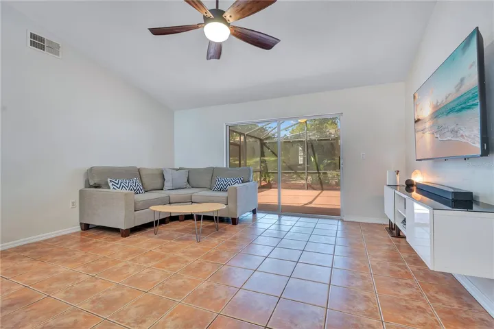 Family Room with view of Screened in Patio