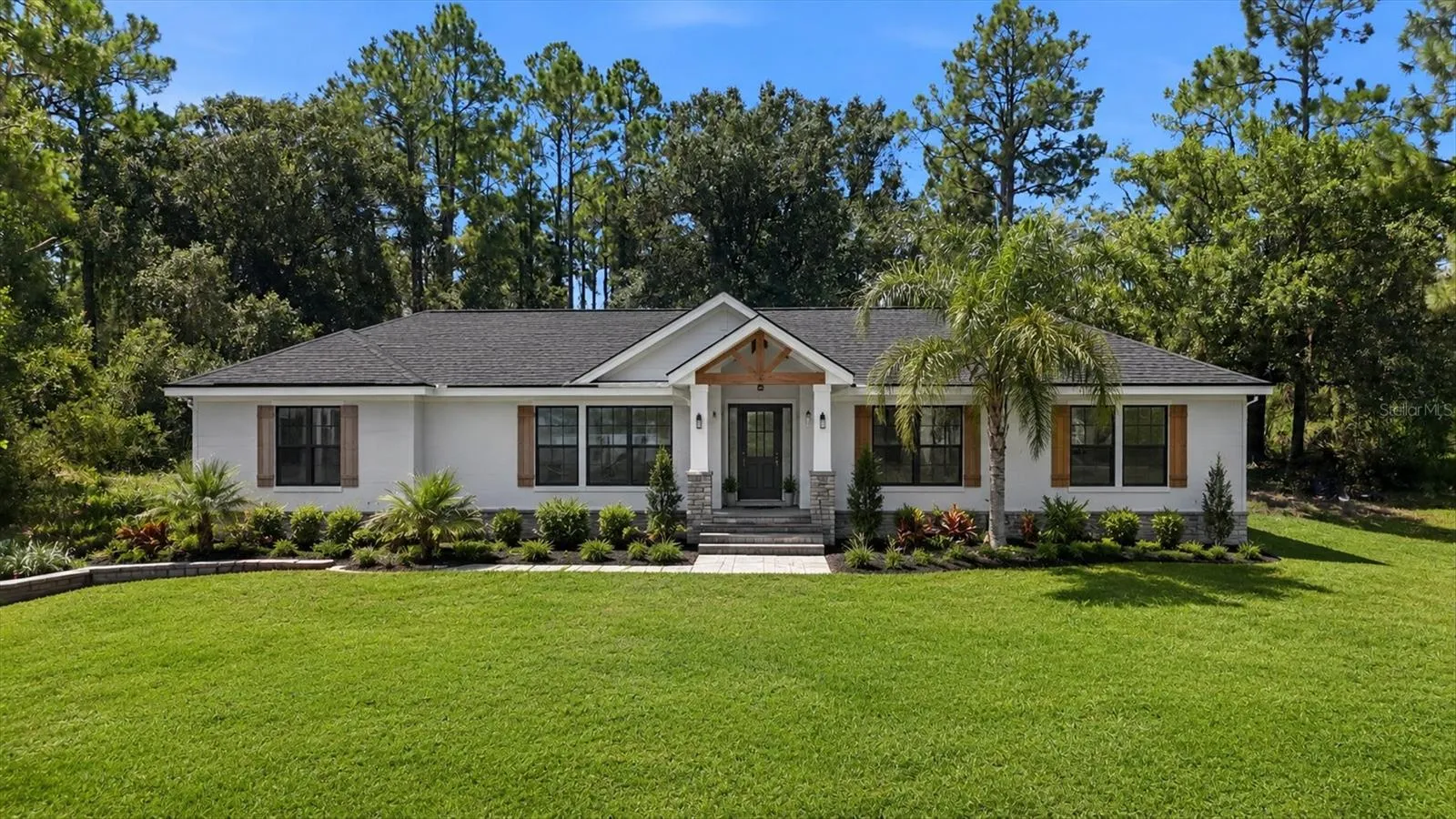 This is a VIRTUAL PHOTO. It is a virtual staged rendering of the possibility of a remodel and landscaping.