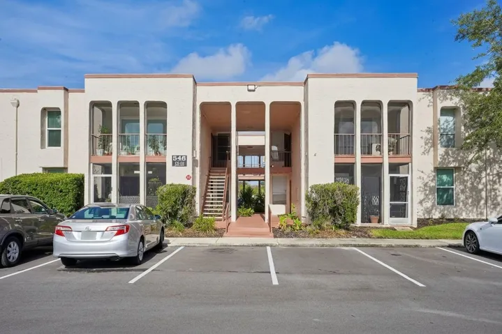 UPDATED ~ FIRST FLOOR condo living meets LAKEFRONT amenities in the Royal Arms community of Altamonte Springs!
