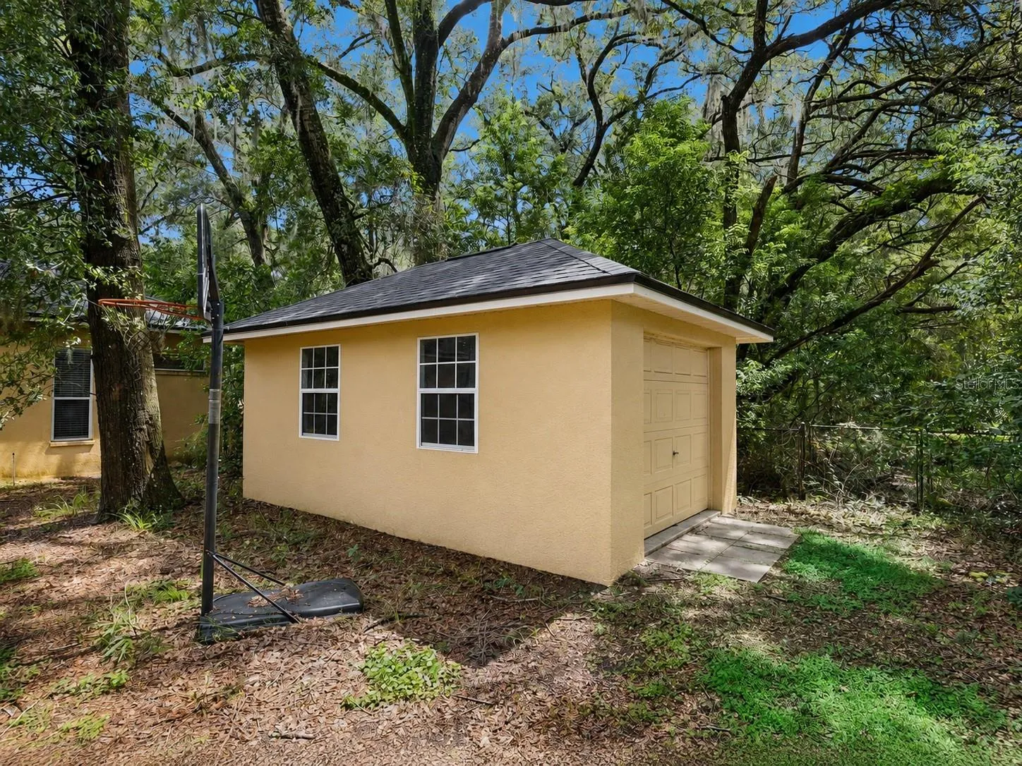 Detached storage building adds valuable space for equipment, hobbies or household storage.