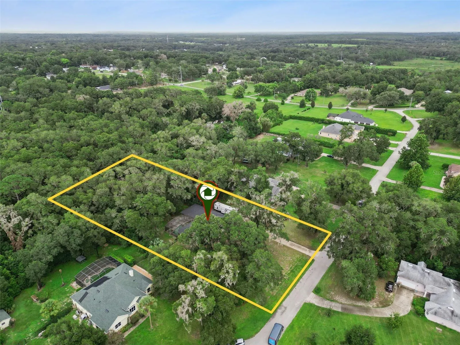 Pinned aerial view provides additional perspective on the home’s location within the surrounding area.