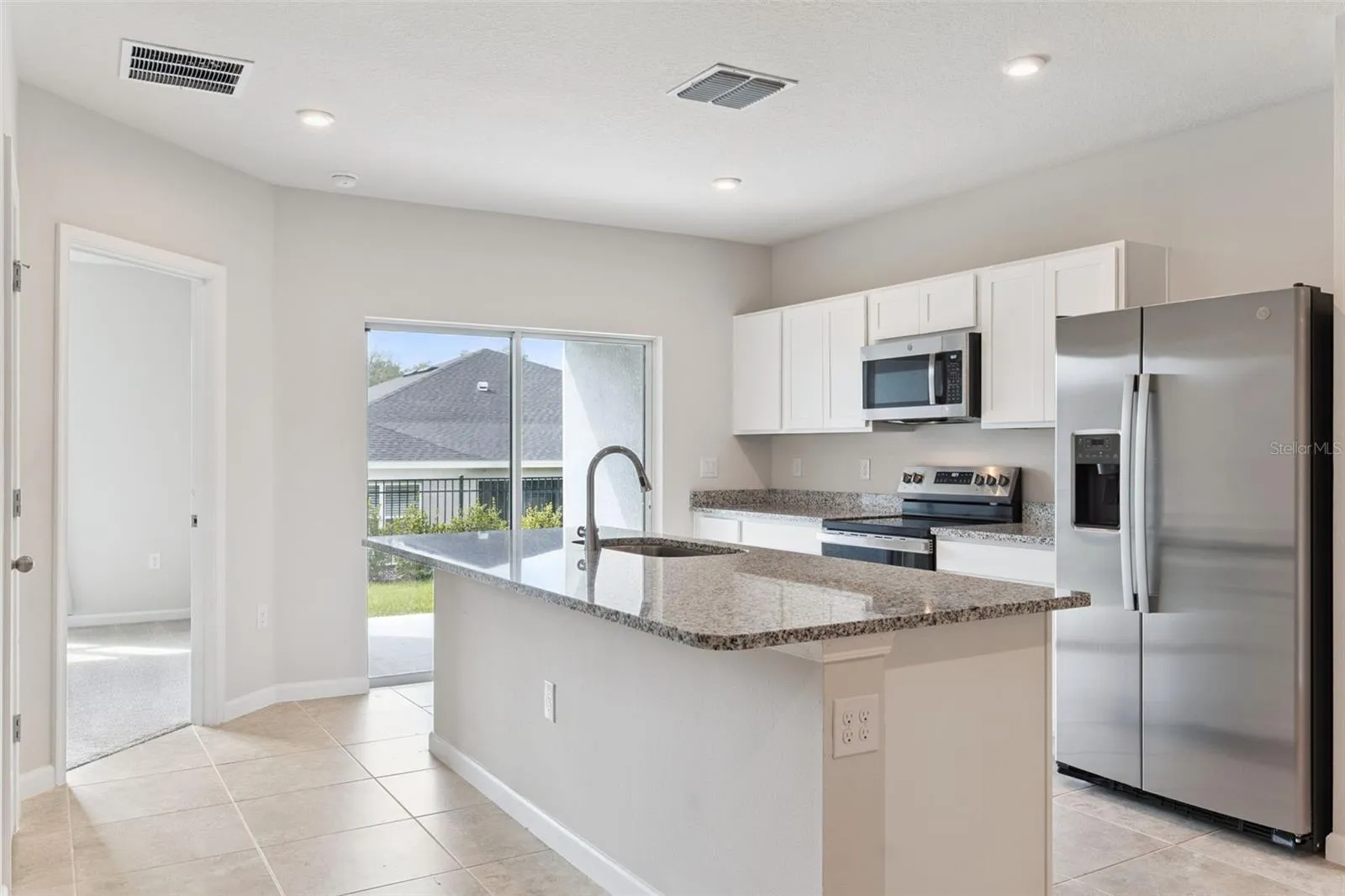Kitchen , door to master bedroom