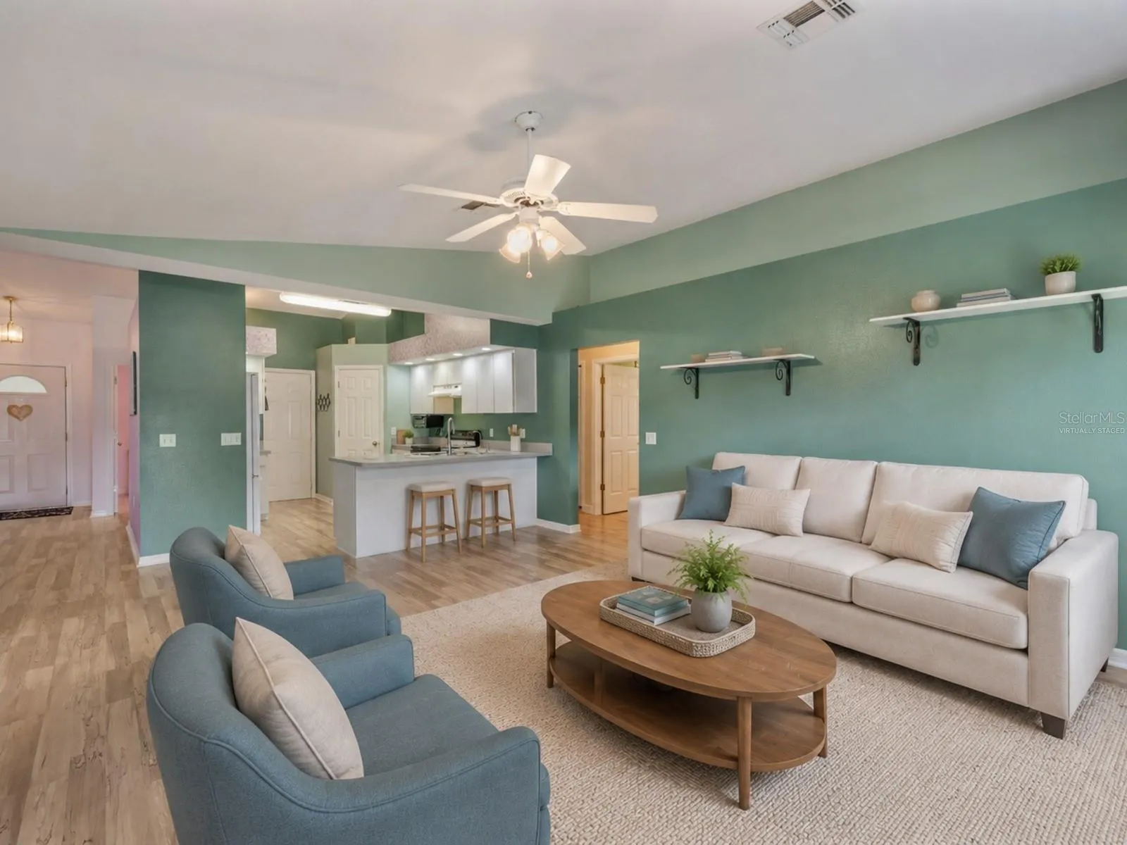 Family Room opened to the kitchen - Virtually Staged to enhance experience.